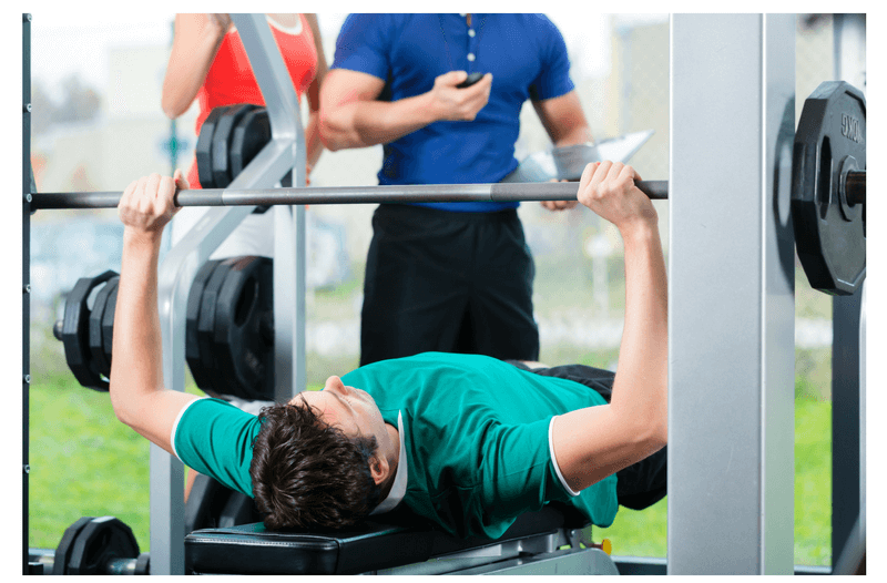 Bench pressing at the gym