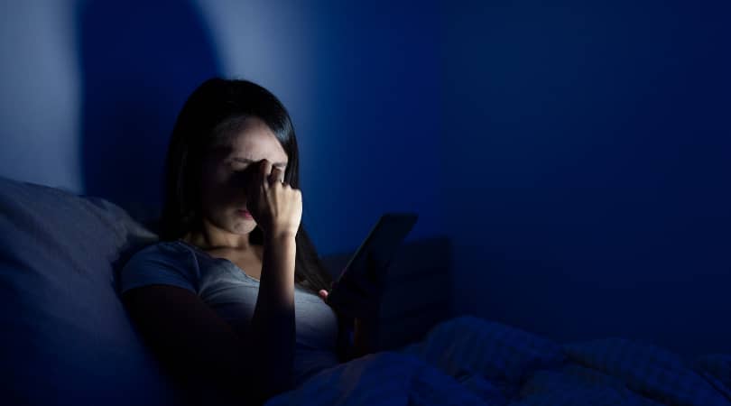 Woman experiencing sleep disruption